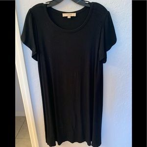Black short sleeved semi loose fitting dress